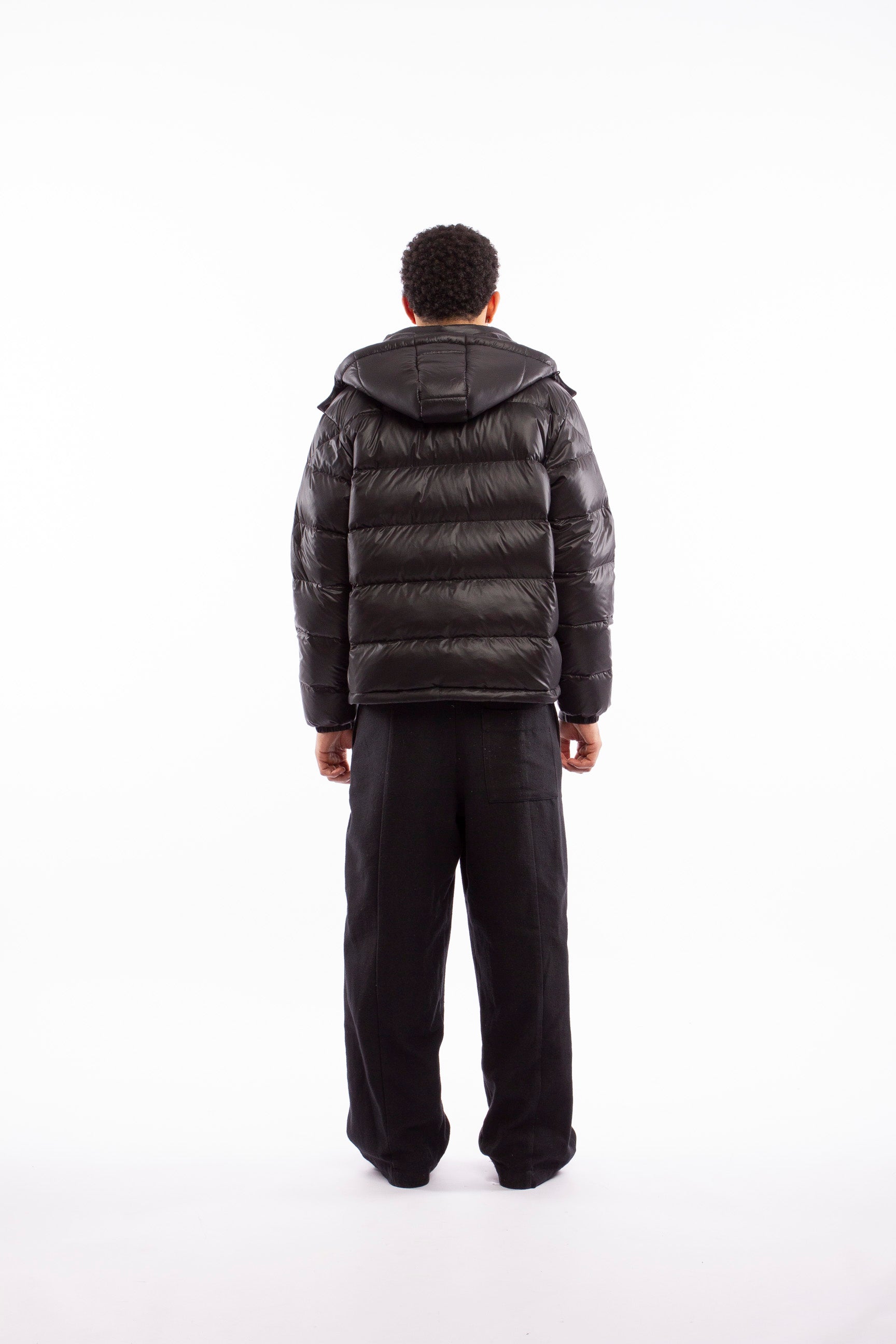 ARCÉVE The Mont Jacket - Rear view of the men's technical winter jacket - Black
